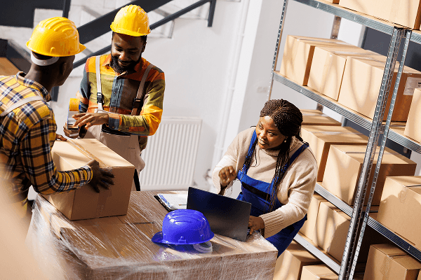 warehouse manager checking orders list coordinating parcels packing process african american woman supervisor with laptop controlling freight cardboard boxes sealing dispatching 1